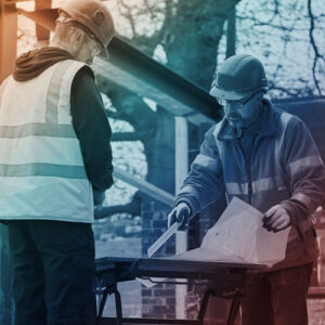 Workers in hard hats and vests